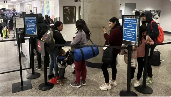 WATCH: Illegal Immigrants Overwhelm Airports, Board Flights To Be Settled Across the US