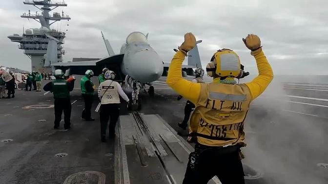 The aircraft carrier USS Nimitz (CVN 68) conducts flight operations ...