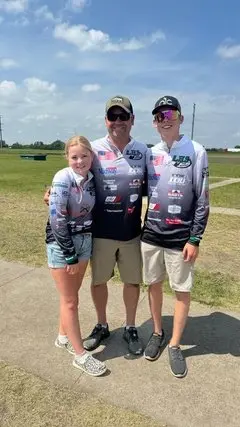 Tate and Kynlee compete at a state trapshooting event with their dad as their coach. (Courtesy of Allison Lundeen)