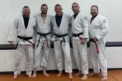 Justin Dodge before the accident, with his Brazilian jujitsu training partners. (Courtesy of Justin Dodge)