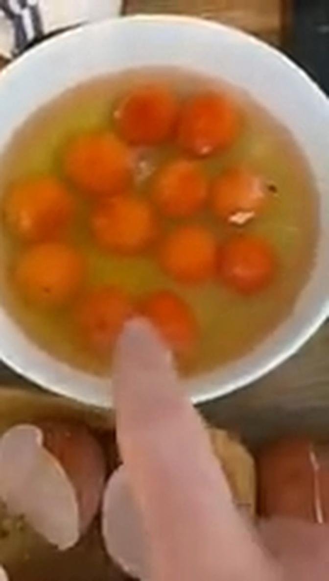 One in a quintillion chance? Man films himself cracking SIX double-yolk eggs