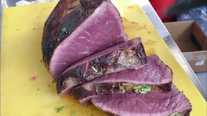 Huge Roast Beef, Flowing Melted Cheese, Roasted Potatoes. Street Food at Greenwich Market, London.